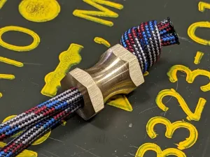 Medium Hex Spool Brass Lanyard Bead and a Free Paracord Lanyard